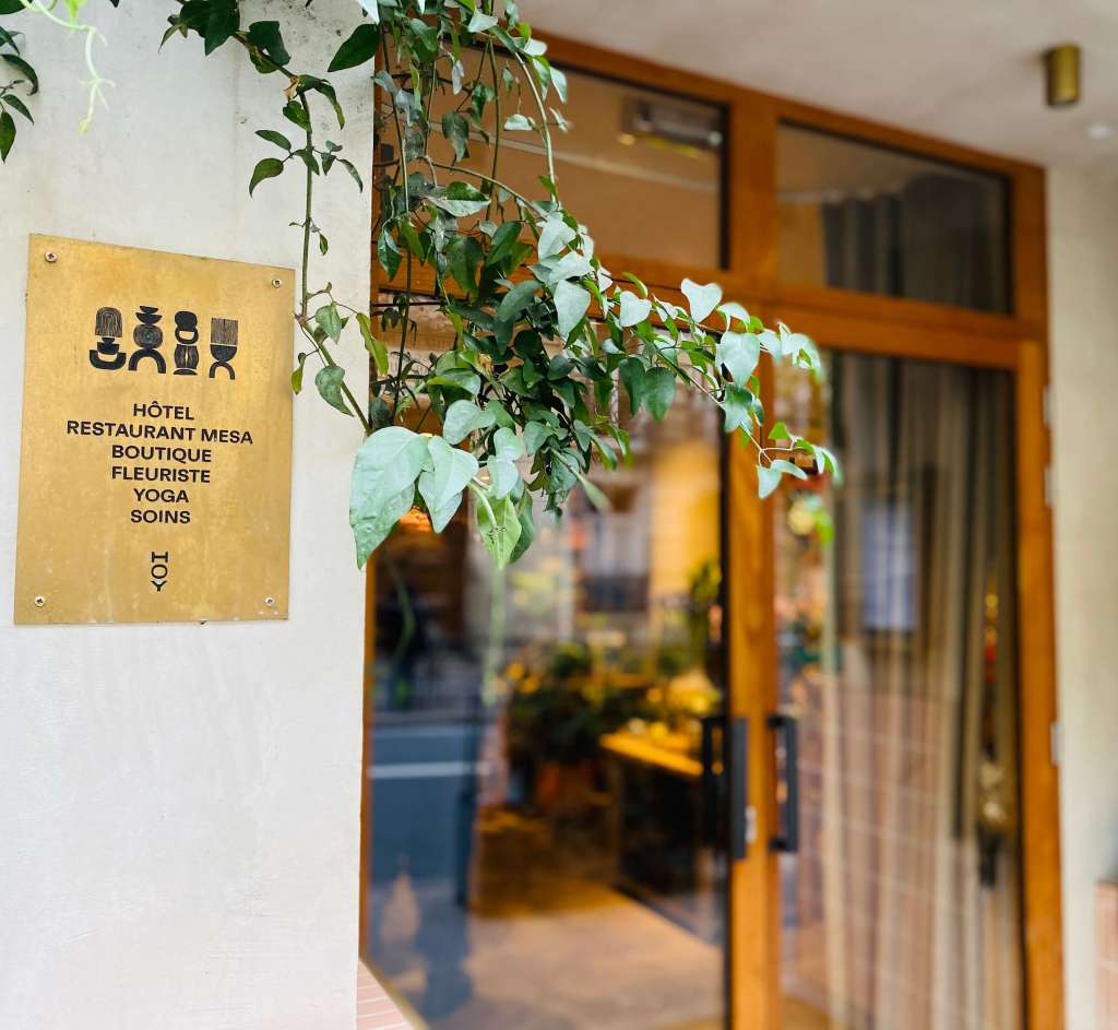 front door of conscious hotel in paris